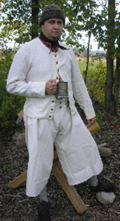 Sherie, Chris wearing pirate era seamans linen slops and jacket.