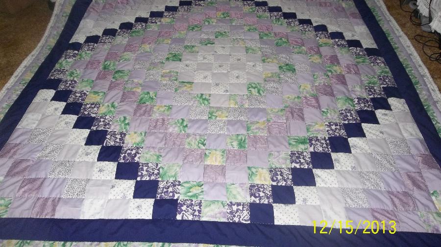Tracy, this is a queen size quilt I made for my aunt for Christmas. I used 41/2 in. squares starting with l...