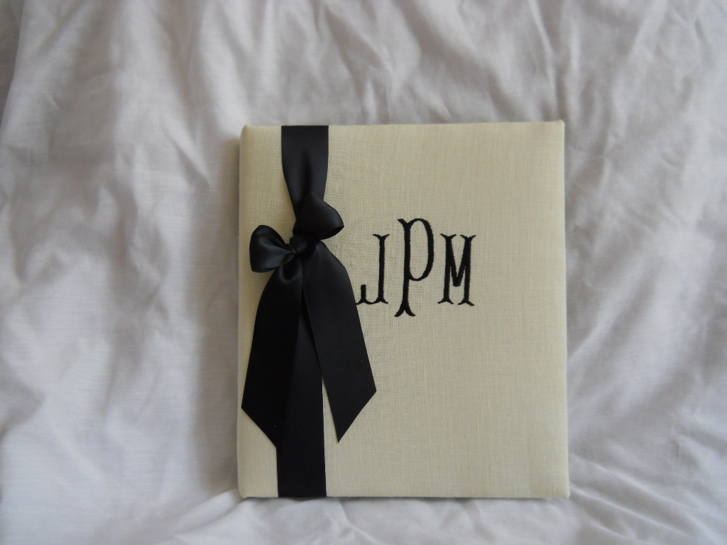 Susie, bone linen monogrammed wedding book available at; https://www.waycooldesigns.com