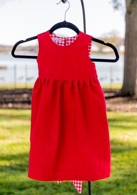 Gigi, A little girls Christmas dress made from Crimson heavyweight linen and lined with cotton.  I added...