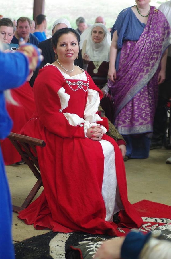 Matthew, This dress is made with 4C22 CRIMSON Softened and is a variation of one worn by Katherine Parr in a...