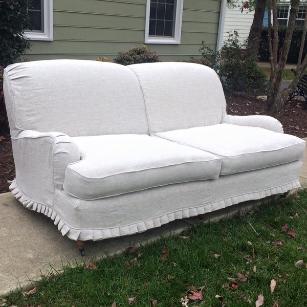 Christy, Sofa slipcover with baby knife pleats.