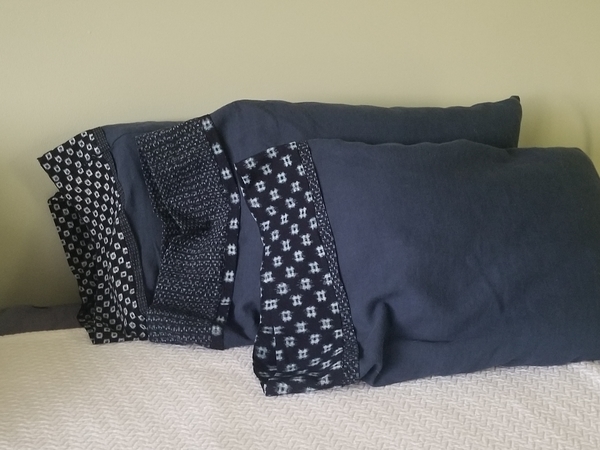 Karen, 4 yds of cobalt mid weight linen sewn into 6 standard size pillowcases using the "burrito"...