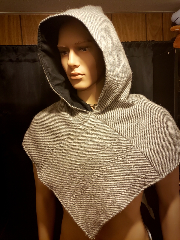 Ryan , Floor loom woven viking hood, made from alpaca wool. It based the design and  weave structure off of...