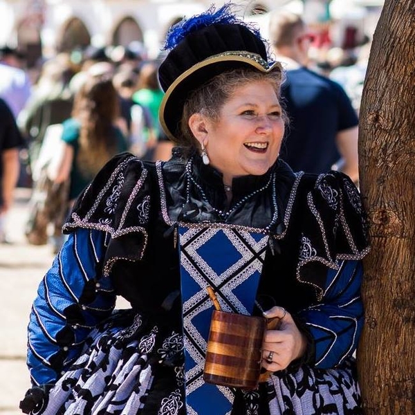 Amy, The shirt is made entirely out of your handkerchief weight black linen, and the rest of the costume...