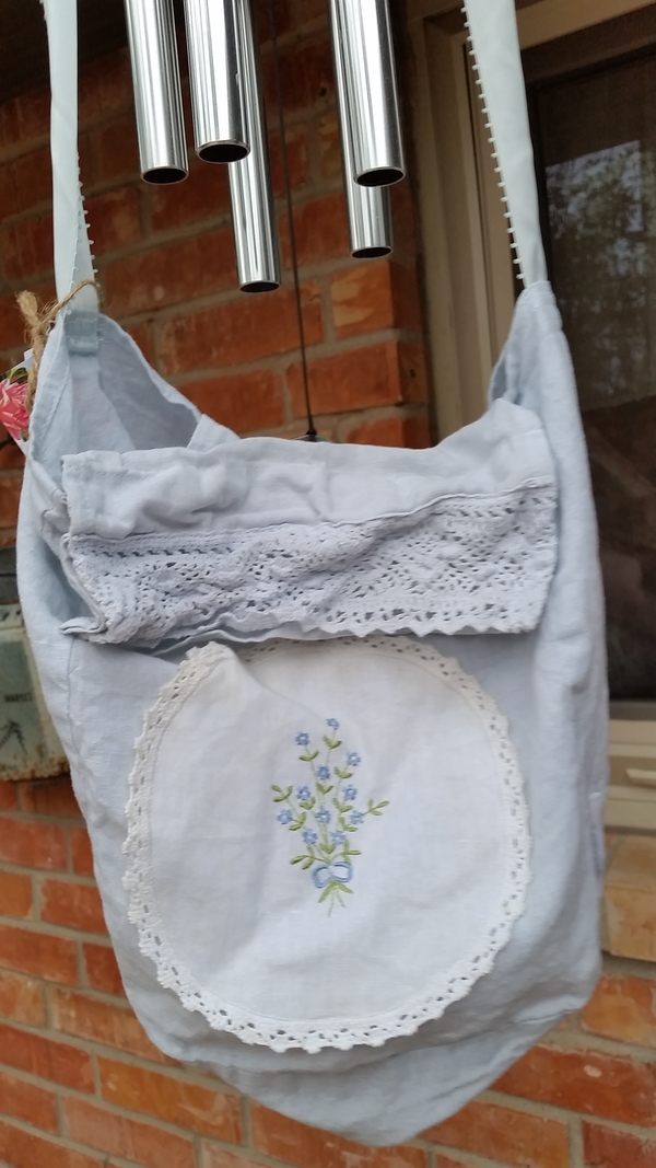 Teresa, Baby blue linen tote/purse embellished with a cotton embroidered doily and crochet lace.
