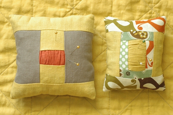 Lana, Pincushions made from linen solids and a cotton print.
