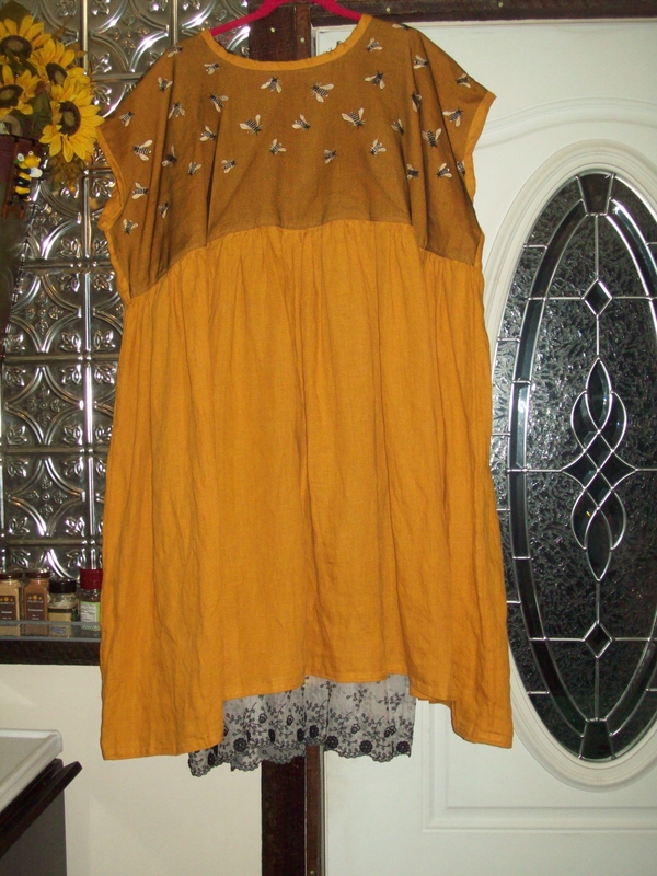 Vickie, Shift dress in autumn gold lightweight linen with a bee mesh overlay