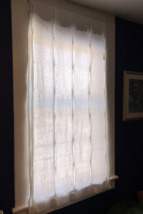 Heather, "Pouf" Window Shade is relaxed when down filtering the room with a linen white glow! Made...