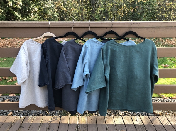 Tina, Linen T-shirts in (L-R) Natural 4C22, Black IL019, Nine Iron IL019, Lagoon IL019, Malachite IL019