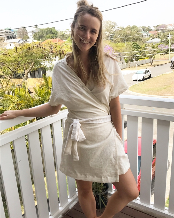 Michaela , This bell bird wrap dress just screams summer day vibes. The ivory linen gives it a relaxed, coastal...