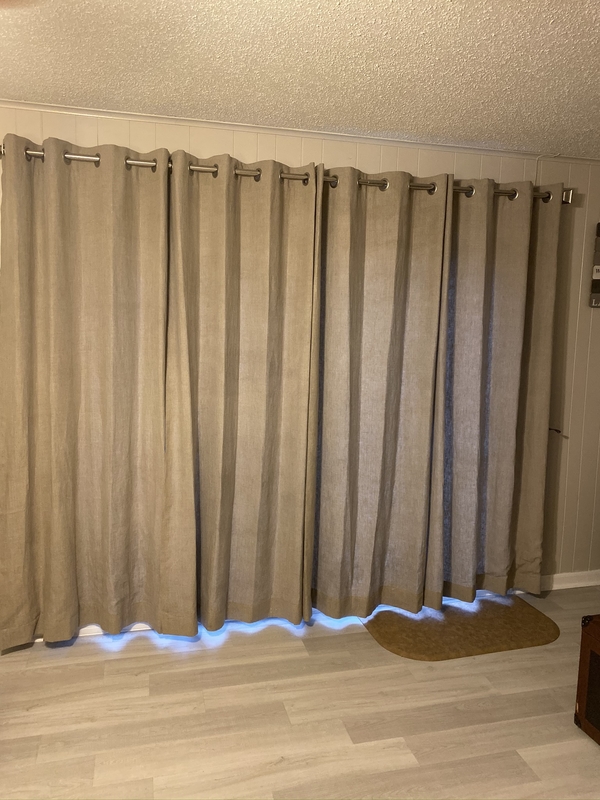 Scottie, Lined Grommet Curtain for the family room sliding door. Made with the natural linen 4C22. Covered th...
