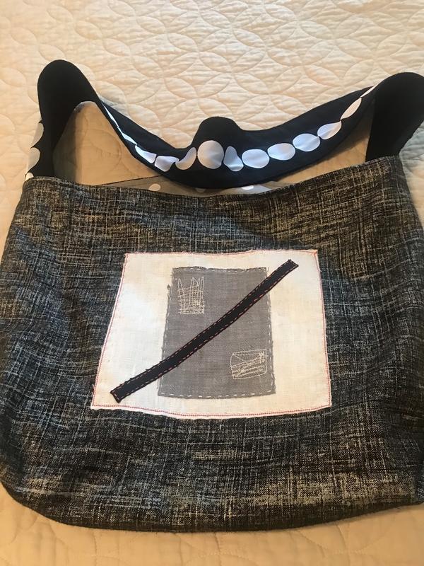 Lynn, A tote bag out of linen. Lined in cotton. Fused collage on front. Strap is linen with a trim attache...