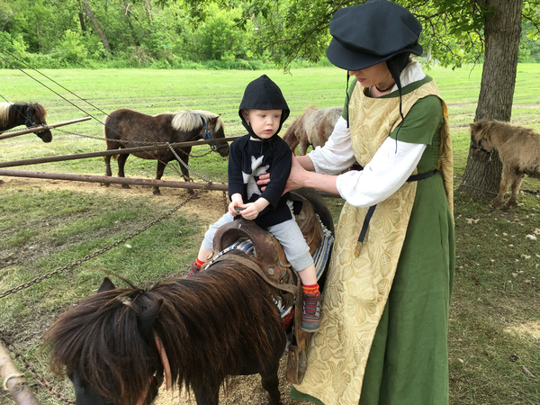 Kira, I sewed this outfit specifically for easy nursing while I worked the Ren Faire as a minstrel. The gr...