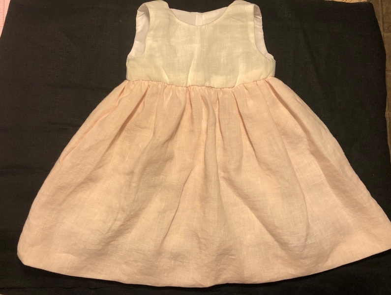Barbara, Baby girl dress made with DB IL019 Soft Pink softened linen for the skirt and DBIL020 Linen Bleached...