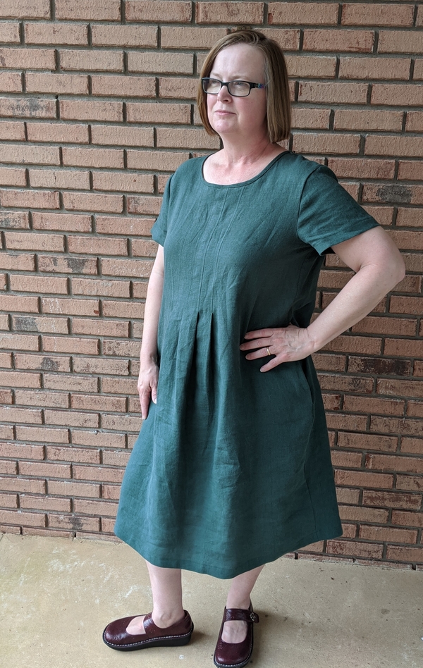 Sandra, Melinda dress in Emerald middle weight.