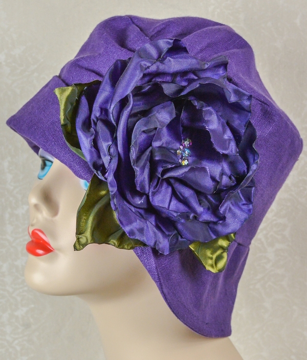 tresa, Cloche  Hat. Purple linen,Silk Flower. This linen is a joy to work with.