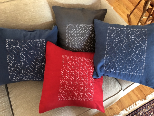 Carol, Four Sashiko embroidered pillow cases.