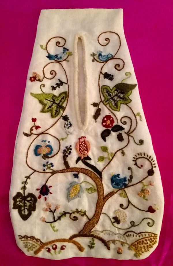 Marilee, This is a 17th century ladies pocket. I created the design and used wool threads to embroider a crew...