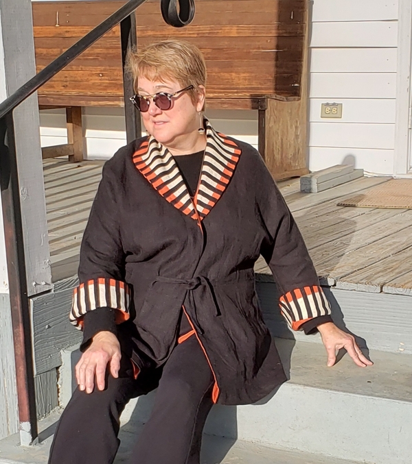Julia, A reversible linen jacket made from bleached, Black and Mecca Orange 4C22 Heavy Linen. Inspired by t...