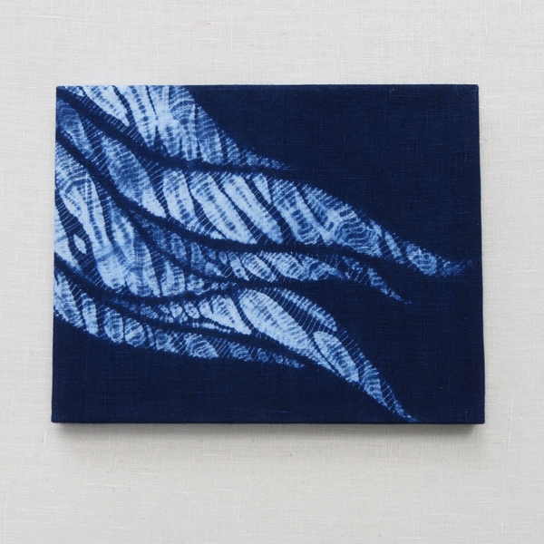 Erica, Shibori wall hanging titled Tidal Flow dyed with natural indigo on ILO19 linen.