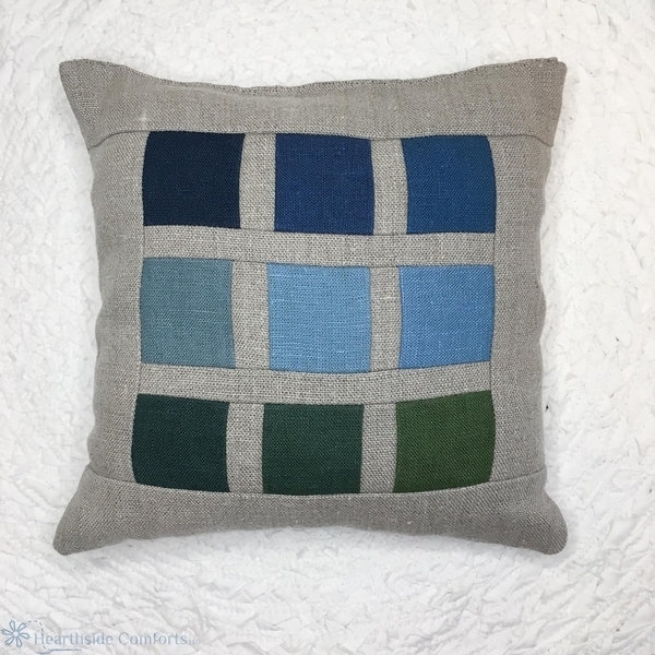 Marilla, This color chart linen pillow is made with color blocks of IL019 and the natural fabric is IL037. It...