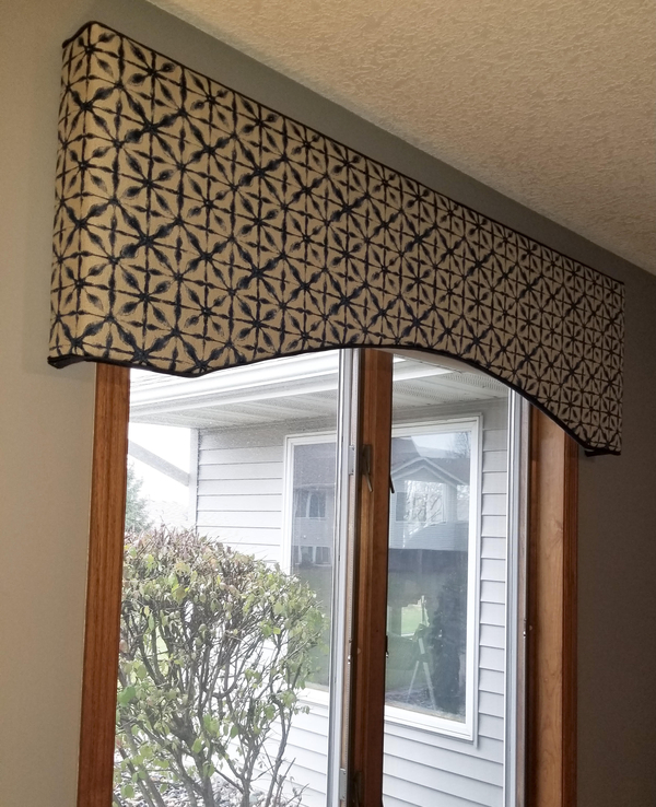 Jill, Decorative upholstered cornice for a guest room.