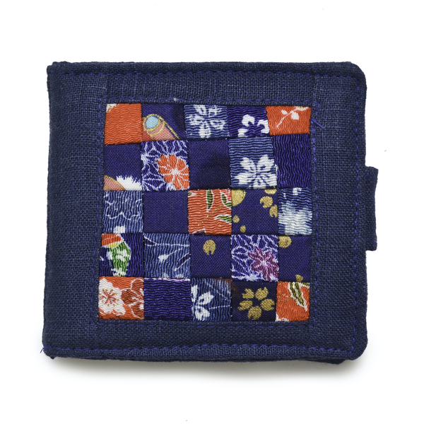 Carol, Needle Keeper:  made of linen fabric with Japanese fabric patchwork embelishment.  Wool felt pages w...