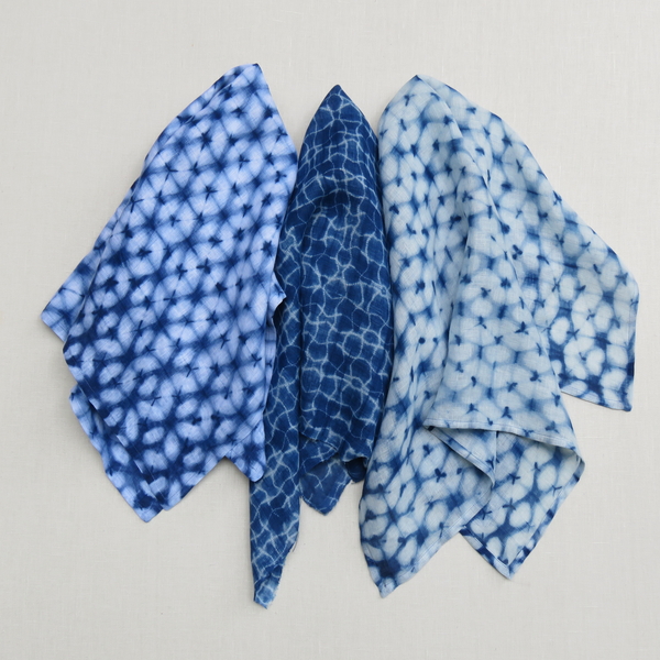 Erica, 3 Indigo dyed furoshiki using various shibori resists