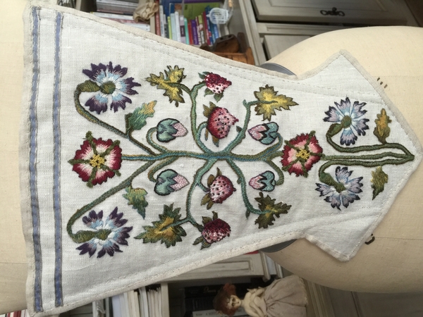 Holly, I have hand embroidered this stomacher in hand dyed silk floss, the Frazer Strawberry motif to where...