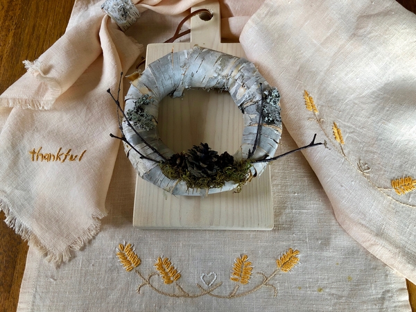 Caryn, Table runner and napkins made with L19 bleached linen naturally dyed with onion skins and hand embro...