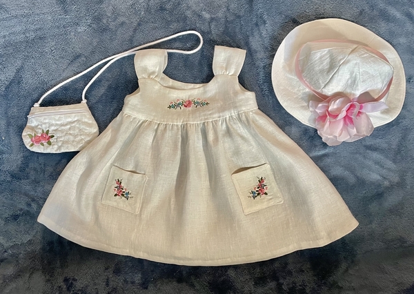 Gwen Ellen, Toddler size 2 dress with machine embroidery. The zippered purse is made “in the hoop” using an embr...