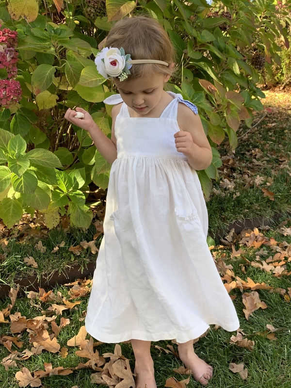 Fusun, This is my little June bug and thinks twirling in her linen dress is very special