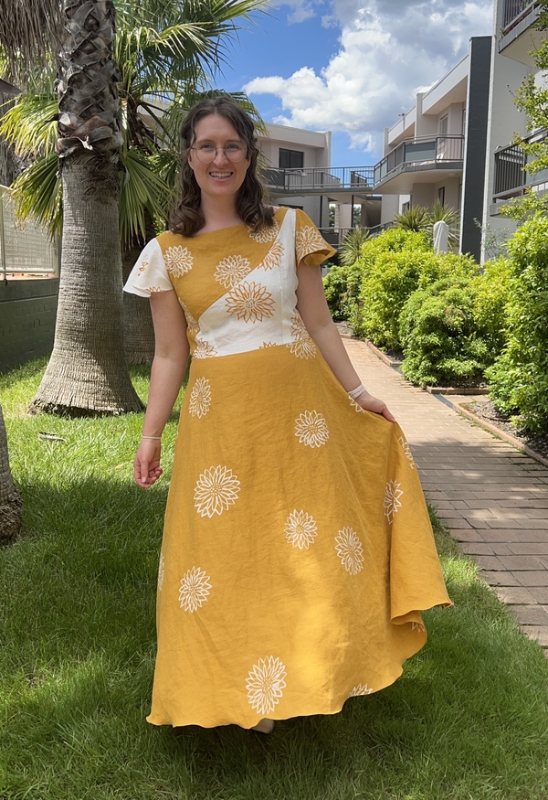 Lauren, A summer sunflower dress, with handpainted sunflowers. I drafted the pattern myself, painted each pa...