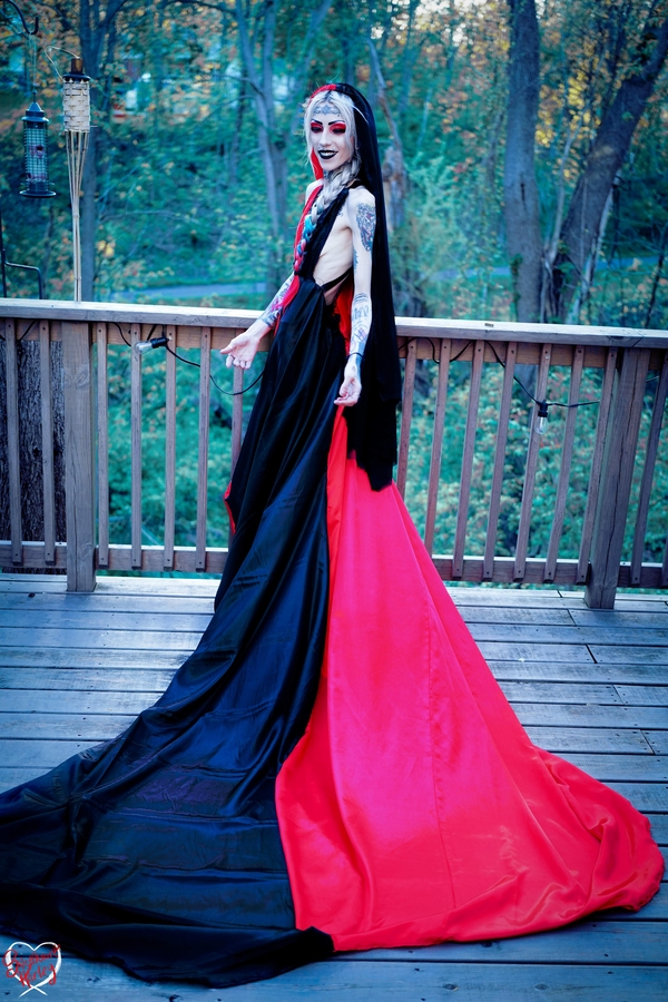 Harleen, A Harley Quinn inspired wedding dress with layered veil and 8-10 foot train.