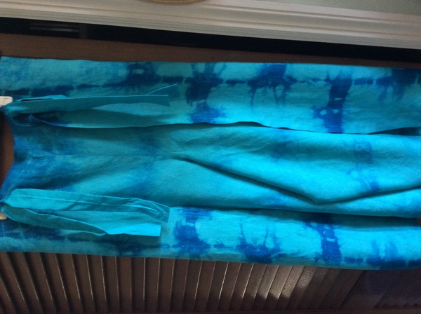 Deon, Shibori dyed wrap pants.  Linen was first dyed with turquoise and then over dyed with indigo.   Grea...