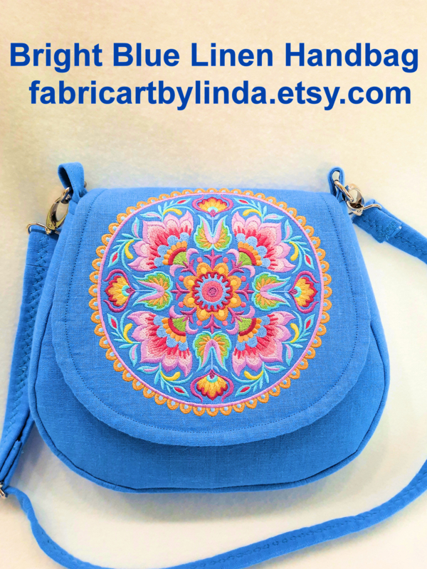 Linda, This cross-body handbag is a new style bag that is a bit smaller, created with pure linen, and heavi...