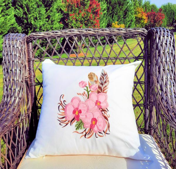 Linda, These decorative pillows incorporate the light airy nature of feathers with bright, delicate orchids...