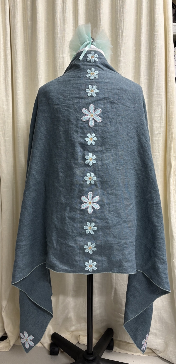 Donna, This shawl I made with 4C22 Rustic Blue Bayou. The daises are also linen. This was made for our Whip...