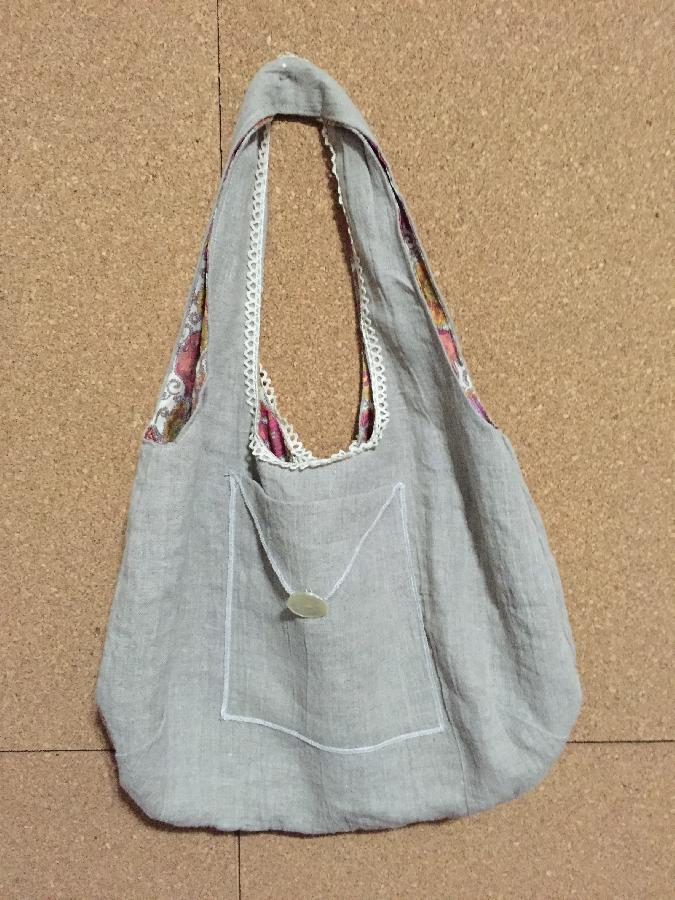 Brigette, This is a little bag I made out of natural medium weight linen.  I added antique lace and an old but...