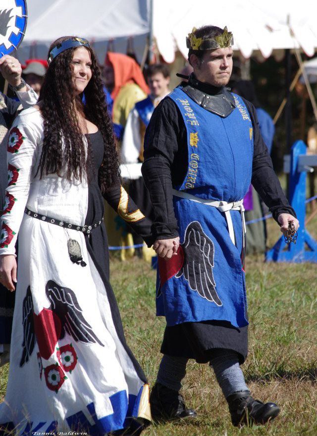 Nicole, This a heraldic cotehardie and fighting tunic for His Grace Valharic and myself.  The other side of...