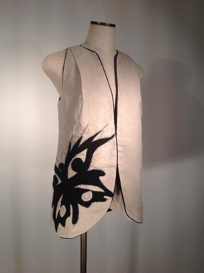 Peter, Linen vest with butterfly appliqué and free form machine stitching. All edges finished with black l...