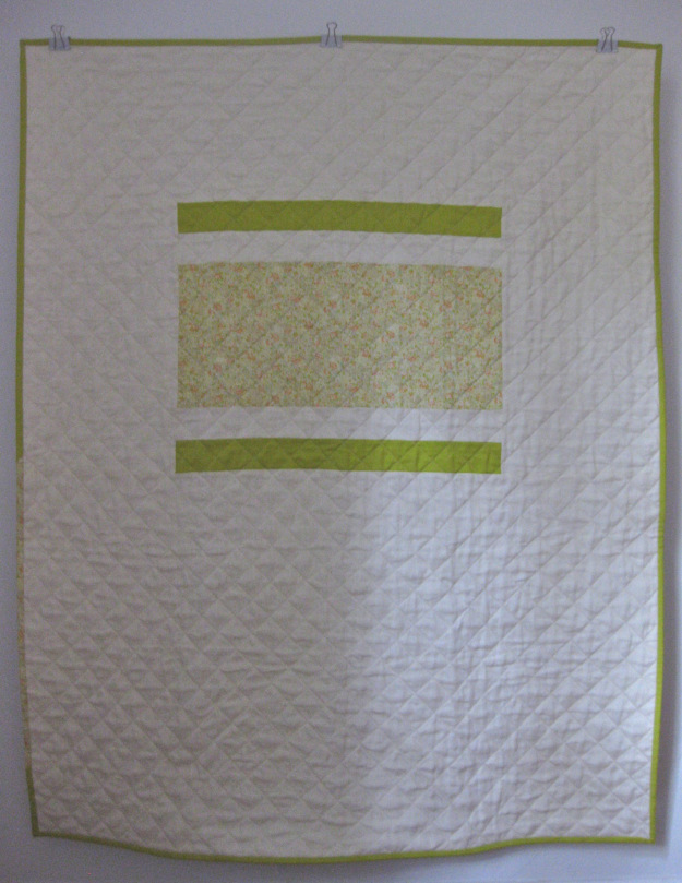 Brigit, This crib or lap quilt uses handkerchief linen in natural and small patches of Japanese import flora...