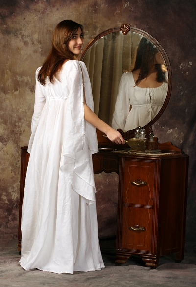 Andrea, A handkerchief weight 100% linen romantic nightgown. Features a double layered empire bodice, bell s...