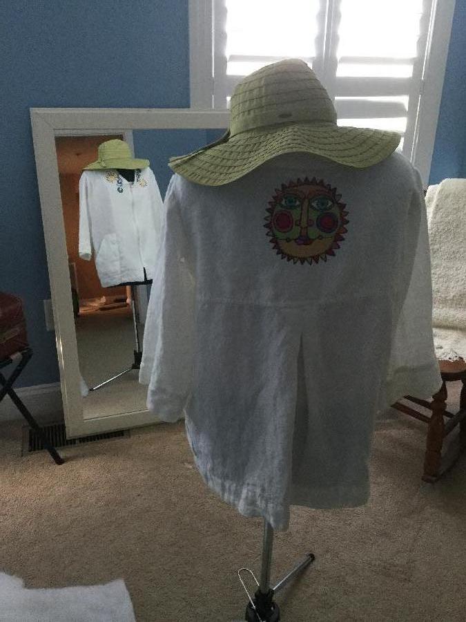 Kathy, This is a Beach coverup. The linen fabric was a dream to embroidery on. The top has a front zipper,...