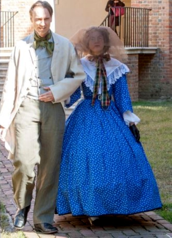 Elizabeth, Tim looking dapper and appropriately rumpled in his:
Natural linen 1850s frock coat
Dark blue and...