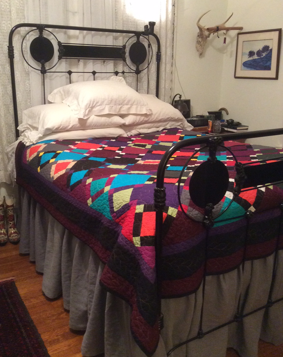 Pat, dust ruffle I made out of IL019 asphalt.  The quilt is made of all cotton.  The ruffle made a ton of...