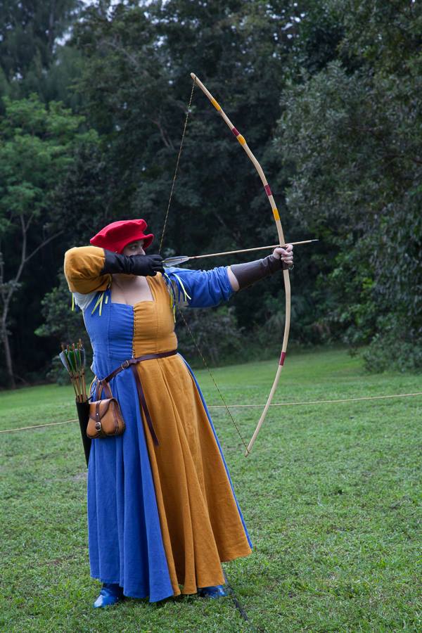 Kathryn, This dress is made of IL019 linen with lace on sleeves.  It is very comfortable on the archery field...