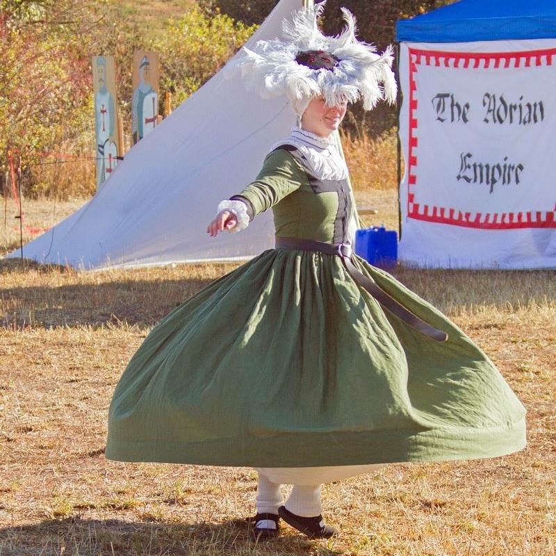 Sara, The Flying Frau! 
16th century German KampFrau gown, Hemdt, Wusthaub, and Tellerbarret.
All made by...