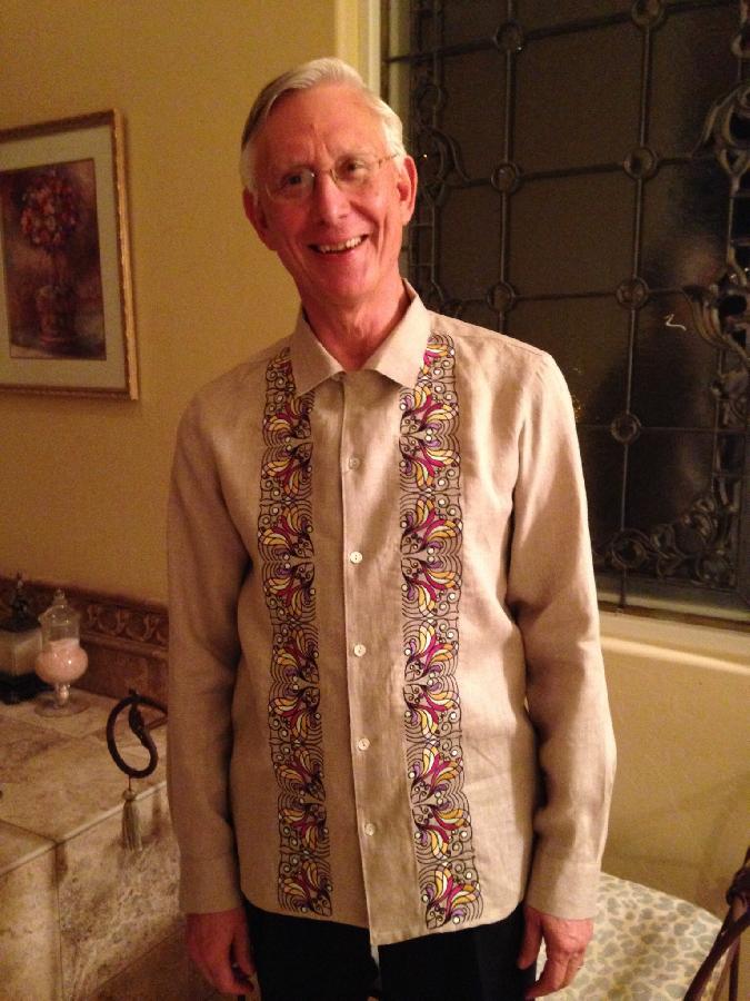 Ann, I made this shirt for my husband, then embroidered the front so that it would look like a Cuban dres...
